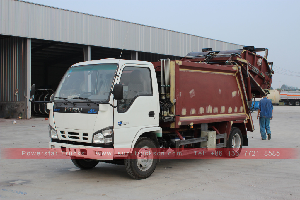 Vehículo compactador de residuos ISUZU NKR en venta
    
